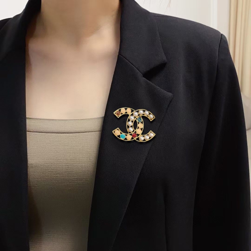 Ch**el brooches